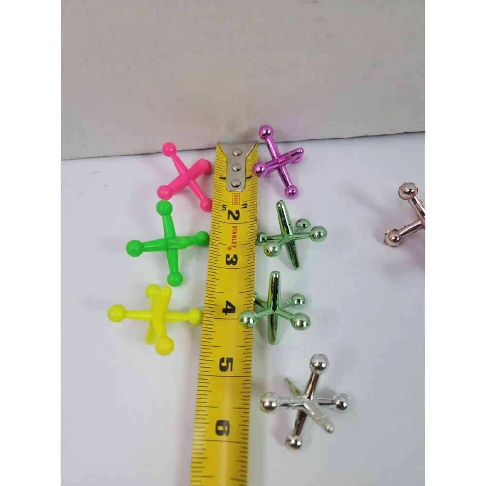 Mixed Lot Jacks Game Pieces Neon Plastic Metallic Replacement Toys No Ball